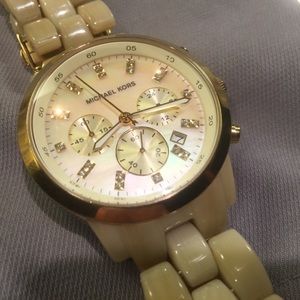Authentic MK watch-new battery-